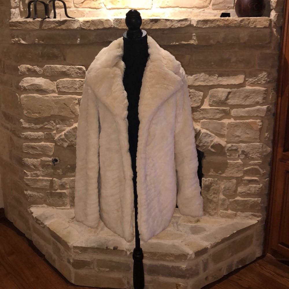 White faux fur coat